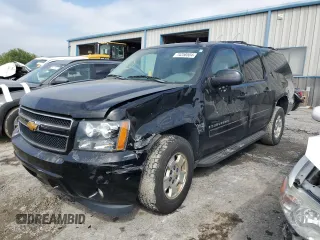 2009 Chevrolet Suburban LT w/1LT with VIN 1GNFK26349R280071, listed as a Copart auction lot 74258504 with 166,122 mi miles and Salvage Title. Bid and sale history available at carsss.com. Image 1.