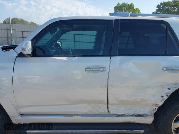 2011 Toyota 4Runner SR5 with VIN JTEZU5JR2B5014781, listed as a IAAI auction lot 42231932 with 124,646 mi miles and . Bid and sale history available at DreamBid. Image 14.