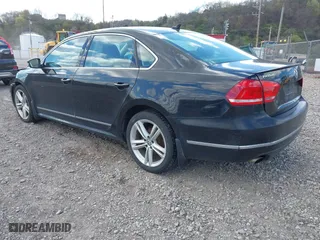 2015 Volkswagen Passat 1.8T Sport with VIN 1VWBT7A35FC062984, listed as a IAAI auction lot 42053939 with 106,095 mi miles. Bid and sale history available at carsss.com. Image 3.