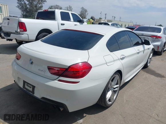 2015 BMW 6 Series 640i with VIN WBA6A0C56FD318007, listed as a IAAI auction lot 42041430 with 78,281 mi miles. Bid and sale history available at carsss.com. Image 4.