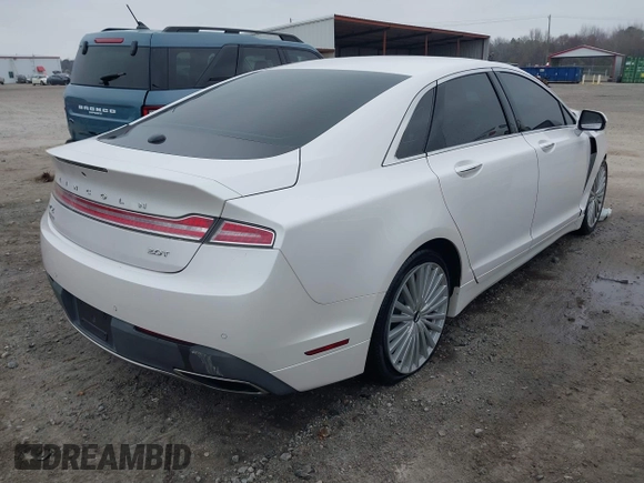 2017 Lincoln MKZ Reserve z VIN 3LN6L5E9XHR619962, wystawiony jako IAAI lot #41791188 z przebiegiem 143 955 mil mil oraz . Historia ofert i sprzedaży dostępna na DreamBid. Obrazek 4.