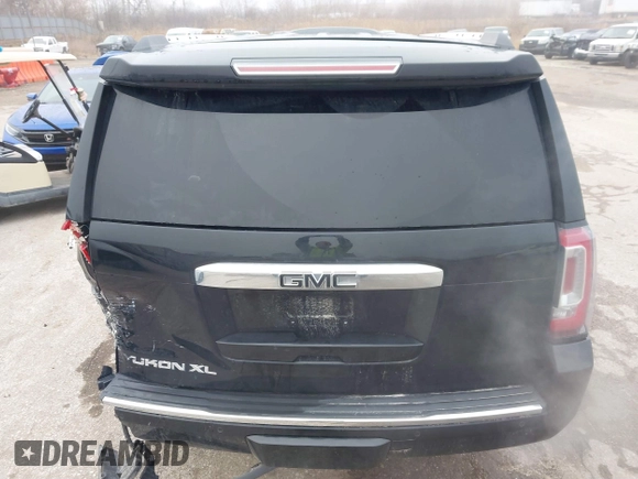 2017 GMC Yukon XL Denali with VIN 1GKS2HKJ2HR310377, listed as a IAAI auction lot 41153582 with 130,194 mi miles. Bid and sale history available at carsss.com. Image 19.