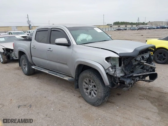2018 Toyota Tacoma SR5 with VIN 3TMAZ5CN7JM053453, listed as a IAAI auction lot 41430111 with 128,149 mi miles. Bid and sale history available at carsss.com. Image 1.