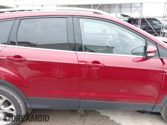 2015 Ford Escape Titanium with VIN 1FMCU0J98FUC07196, listed as a IAAI auction lot 41930660 with 51,161 mi miles and . Bid and sale history available at DreamBid. Image 13.