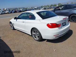 2015 BMW 4 Series 428i z VIN WBA3V7C58FP771642, wystawiony jako IAAI lot #42524828 z przebiegiem 64 440 mil mil oraz . Historia ofert i sprzedaży dostępna na DreamBid. Obrazek 3.