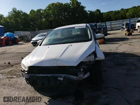 2017 Ford Focus SE with VIN 1FADP3F28HL309268, listed as a Copart auction lot 57995985 with 99,277 mi miles and Salvage title. Bid and sale history available at DreamBid. Image 13.