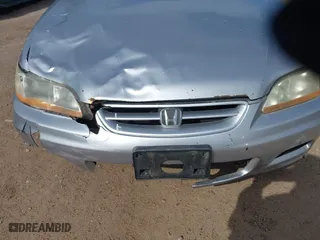 2001 Honda Accord Cpe EX with VIN 1HGCG31571A005892, listed as a IAAI auction lot 42022588 with 202,497 mi miles. Bid and sale history available at carsss.com. Image 6.