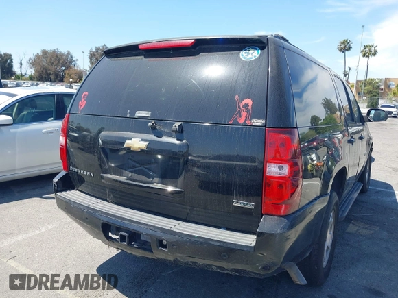 2011 Chevrolet Suburban LT with VIN 1GNSCJE0XBR285973, listed as a IAAI auction lot 42007844 with 252,994 mi miles. Bid and sale history available at carsss.com. Image 4.