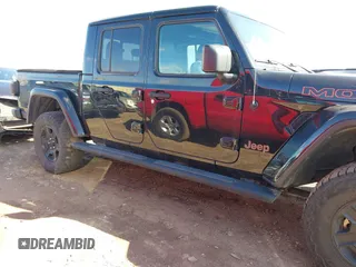 2021 Jeep Gladiator Mojave with VIN 1C6JJTEG9ML528964, listed as a IAAI auction lot 41879113 with 74,315 mi miles and . Bid and sale history available at DreamBid. Image 13.