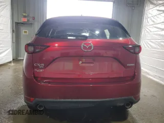 2021 Mazda CX-5 Grand Touring with VIN JM3KFBDM8M0434857, listed as a Copart auction lot 47286545 with Not Provided miles and Salvage Title. Bid and sale history available at DreamBid. Image 6.