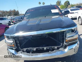 2016 Chevrolet Silverado 1500 LT with VIN 1GCRCREC0GZ246817, listed as a IAAI auction lot 41804303 with 39,198 mi miles and . Bid and sale history available at DreamBid. Image 13.