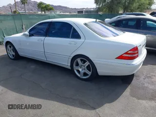 2002 Mercedes-Benz S 5.0L with VIN WDBNG75J92A261294, listed as a IAAI auction lot 42141509 with 116,532 mi miles. Bid and sale history available at carsss.com. Image 3.