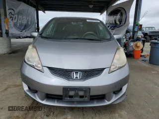 2009 Honda Fit Sport z VIN JHMGE884X9C002533, wystawiony jako Copart lot #62222155 z przebiegiem 133 148 mil mil oraz Czysty tytuł • Clean title. Historia ofert i sprzedaży dostępna na DreamBid. Obrazek 5.