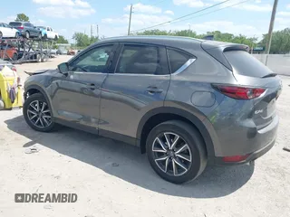 2017 Mazda CX-5 Grand Touring with VIN JM3KFADL3H0227655, listed as a IAAI auction lot 41897981 with 103,545 mi miles. Bid and sale history available at carsss.com. Image 3.