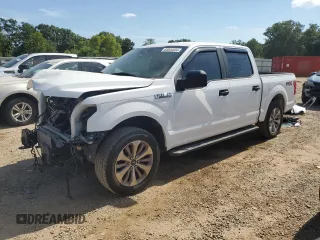 2018 Ford F-150 XL with VIN 1FTEW1CPXJKF27567, listed as a Copart auction lot 63034034 with 125,508 mi miles and Salvage title. Bid and sale history available at DreamBid. Image 1.
