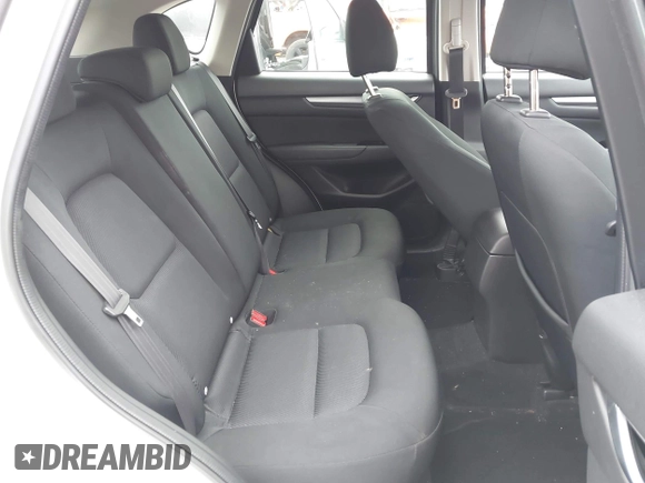 2019 Mazda CX-5 Sport with VIN JM3KFBBM2K0629966, listed as a IAAI auction lot 41953702 with 48,496 mi miles and . Bid and sale history available at DreamBid. Image 8.