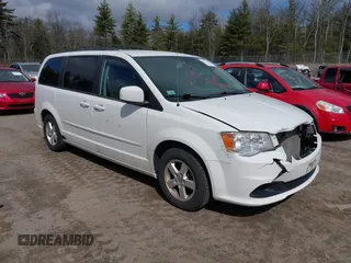 2012 Dodge Grand Caravan SXT with VIN 2C4RDGCGXCR248859, listed as a IAAI auction lot 41829411 with 111,515 mi miles and . Bid and sale history available at DreamBid. Image 1.