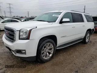 2016 GMC Yukon XL SLT with VIN 1GKS2GKC4GR335565, listed as a Copart auction lot 59208805 with 176,128 mi miles and Salvage title. Bid and sale history available at DreamBid. Image 1.