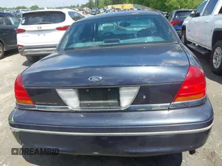 2000 Ford Crown Victoria LX с VIN 2FAFP74W4YX116561, выставлен на аукционе IAAI как лот 42101875 с пробегом Не указан миль и . История ставок и продаж доступна на DreamBid. Изображение 16.