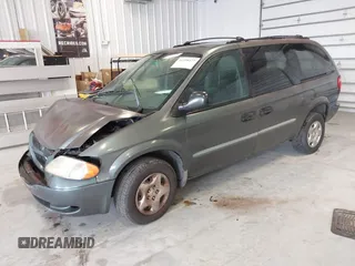 2003 Dodge Caravan SE with VIN 1D4GP24313B191319, listed as a IAAI auction lot 41398477 with 220,083 mi miles. Bid and sale history available at carsss.com. Image 2.