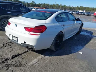 2013 BMW 6 Series 650i xDrive with VIN WBA6B4C59DD098329, listed as a IAAI auction lot 41404788 with 139,677 mi miles. Bid and sale history available at carsss.com. Image 4.