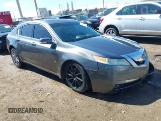 2009 Acura TL Tech with VIN 19UUA86589A003009, listed as a IAAI auction lot 41853122 with 150,863 mi miles. Bid and sale history available at carsss.com. Image 1.