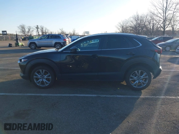 2023 Mazda CX-30 2.5 S Select Package with VIN 3MVDMBBM3PM584854, listed as a IAAI auction lot 41736925 with 39,008 mi miles. Bid and sale history available at carsss.com. Image 14.