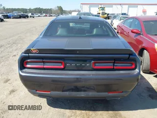 2017 Dodge Challenger SXT z VIN 2C3CDZAG6HH665661, wystawiony jako IAAI lot #41779875 z przebiegiem 97 280 mil mil oraz . Historia ofert i sprzedaży dostępna na DreamBid. Obrazek 16.