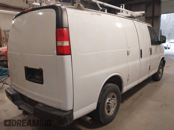 2015 Chevrolet Express Cargo Van with VIN 1GCWGFCF9F1167677, listed as a IAAI auction lot 42018087 with 148,263 mi miles. Bid and sale history available at carsss.com. Image 4.