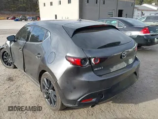 2021 Mazda 3 Premium with VIN JM1BPAML2M1310374, listed as a IAAI auction lot 41190608 with 97,648 mi miles. Bid and sale history available at carsss.com. Image 14.