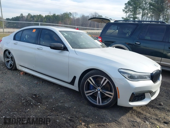 2017 BMW 7 Series 750i with VIN WBA7F0C58HGM21467, listed as a IAAI auction lot 41632663 with 136,620 mi miles. Bid and sale history available at carsss.com. Image 1.