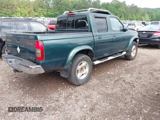 2000 Nissan Frontier XE with VIN 1N6ED27T5YC429406, listed as a IAAI auction lot 42150671 with 303,869 mi miles and . Bid and sale history available at DreamBid. Image 4.