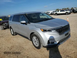 2023 Kia Carnival LX with VIN KNDNB4H39P6273290, listed as a Copart auction lot 82188894 with 22,612 mi miles and Salvage Title. Bid and sale history available at carsss.com. Image 4.