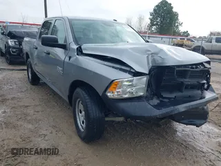 2023 Ram 1500 Classic Tradesman with VIN 3C6RR6KGXPG656150, listed as a IAAI auction lot 41346453 with 57,147 mi miles. Bid and sale history available at carsss.com. Image 1.