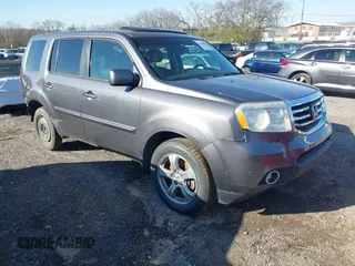 2014 Honda Pilot EX-L with VIN 5FNYF3H59EB026317, listed as a IAAI auction lot 41820951 with 209,440 mi miles. Bid and sale history available at carsss.com. Image 1.