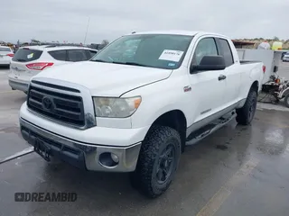 2011 Toyota Tundra 4WD Truck with VIN 5TFUW5F18BX188306, listed as a IAAI auction lot 41898176 with 221,744 mi miles. Bid and sale history available at carsss.com. Image 2.