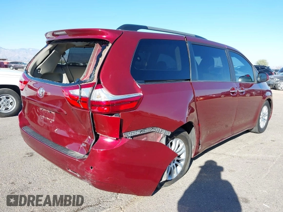 2015 Toyota Sienna XLE with VIN 5TDYK3DCXFS621190, listed as a IAAI auction lot 41646481 with 173,817 mi miles. Bid and sale history available at carsss.com. Image 6.