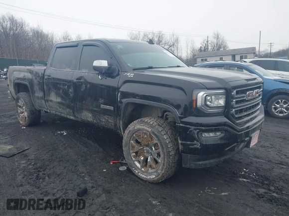 2018 GMC Sierra 1500 SLE z VIN 3GTU2MEC8JG249701, wystawiony jako IAAI lot #41556135 z przebiegiem 87 657 mil mil oraz . Historia ofert i sprzedaży dostępna na DreamBid. Obrazek 1.
