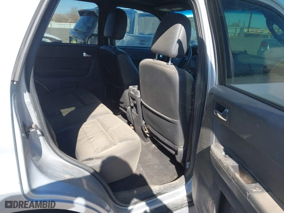 2010 Ford Escape Limited with VIN 1FMCU9EG8AKB12610, listed as a IAAI auction lot 41834872 with 214,218 mi miles. Bid and sale history available at carsss.com. Image 8.