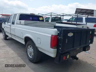 1996 Ford F-250 with VIN 1FTHX25F4TEB61031, listed as a IAAI auction lot 42055061 with 338,618 mi miles. Bid and sale history available at carsss.com. Image 3.