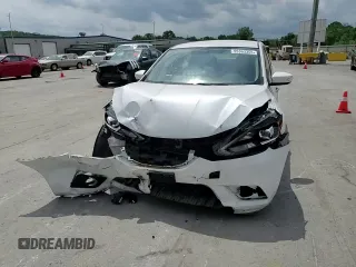 2017 Nissan Sentra SR z VIN 3N1AB7AP7HY303218, wystawiony jako Copart lot #55363355 z przebiegiem 67 641 mil mil oraz Szkoda całkowita • Salvage title. Historia ofert i sprzedaży dostępna na DreamBid. Obrazek 13.