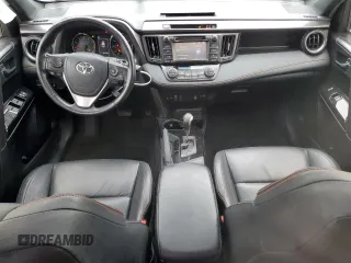 2018 Toyota RAV4 SE with VIN JTMJFREV2JJ730077, listed as a Copart auction lot 56666055 with 85,100 mi miles and Salvage title. Bid and sale history available at DreamBid. Image 8.