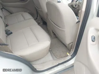2005 Ford Escape XLT with VIN 1FMYU93135DA07844, listed as a IAAI auction lot 41786019 with 118,840 mi miles. Bid and sale history available at carsss.com. Image 8.