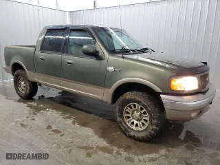 2001 Ford F-150 SuperCrew XLT with VIN 1FTRW08L41KB56181, listed as a Copart auction lot 70874634 with 209,227 mi miles and Clean Title. Bid and sale history available at carsss.com. Image 4.
