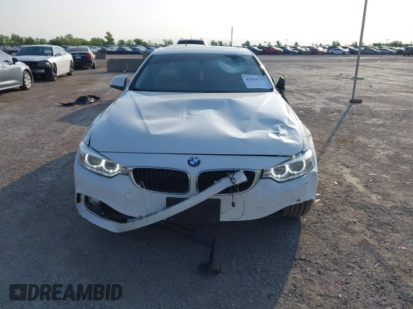 2015 BMW 4 Series 428i z VIN WBA3N7C58FK224500, wystawiony jako IAAI lot #42044727 z przebiegiem 71 815 mil mil oraz . Historia ofert i sprzedaży dostępna na DreamBid. Obrazek 6.