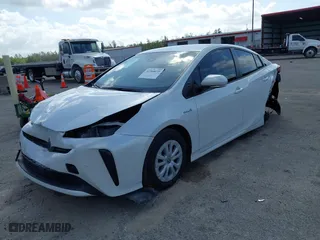 2022 Toyota Prius L Eco with VIN JTDKAMFU5N3181724, listed as a IAAI auction lot 41568635 with 67,360 mi miles. Bid and sale history available at carsss.com. Image 2.