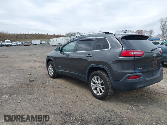 2014 Jeep Cherokee Latitude with VIN 1C4PJMCS5EW201459, listed as a IAAI auction lot 42092653 with 147,430 mi miles. Bid and sale history available at carsss.com. Image 3.