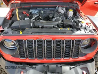 2024 Jeep Gladiator Rubicon z VIN 1C6JJTBG7RL105165, wystawiony jako Copart lot #57459125 z przebiegiem 2 092 mil mil oraz Szkoda całkowita • Salvage title. Historia ofert i sprzedaży dostępna na DreamBid. Obrazek 11.