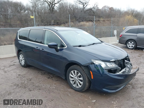 2017 Chrysler Pacifica Touring with VIN 2C4RC1DG3HR592796, listed as a IAAI auction lot 40941158 with 157,291 mi miles and . Bid and sale history available at DreamBid. Image 1.