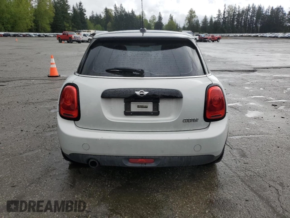 2016 MINI Hardtop 4 Door z VIN WMWXU1C51G2D12553, wystawiony jako Copart lot #52935265 z przebiegiem 57 593 mil mil oraz Szkoda całkowita • Salvage title. Historia ofert i sprzedaży dostępna na DreamBid. Obrazek 6.